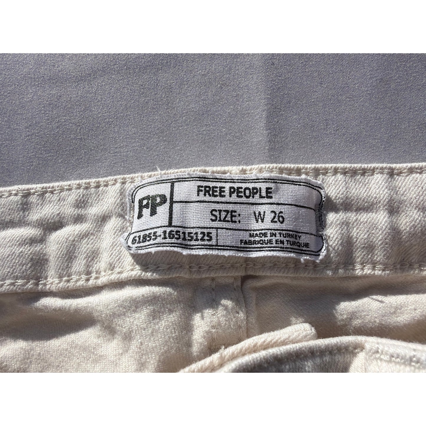 Free People Size 26W White With Beaded Sides Ripped Distressed Hem Jeans