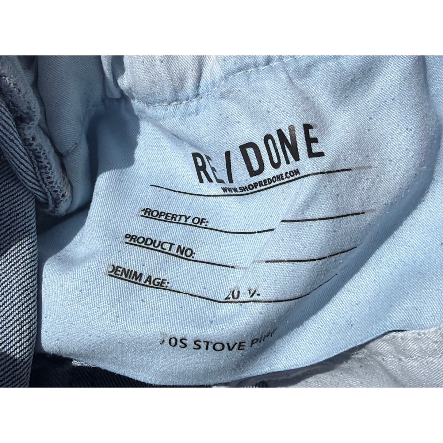 Re/Done Size 28  "70's Stove Pipe" Medium Wash Distressed Hem