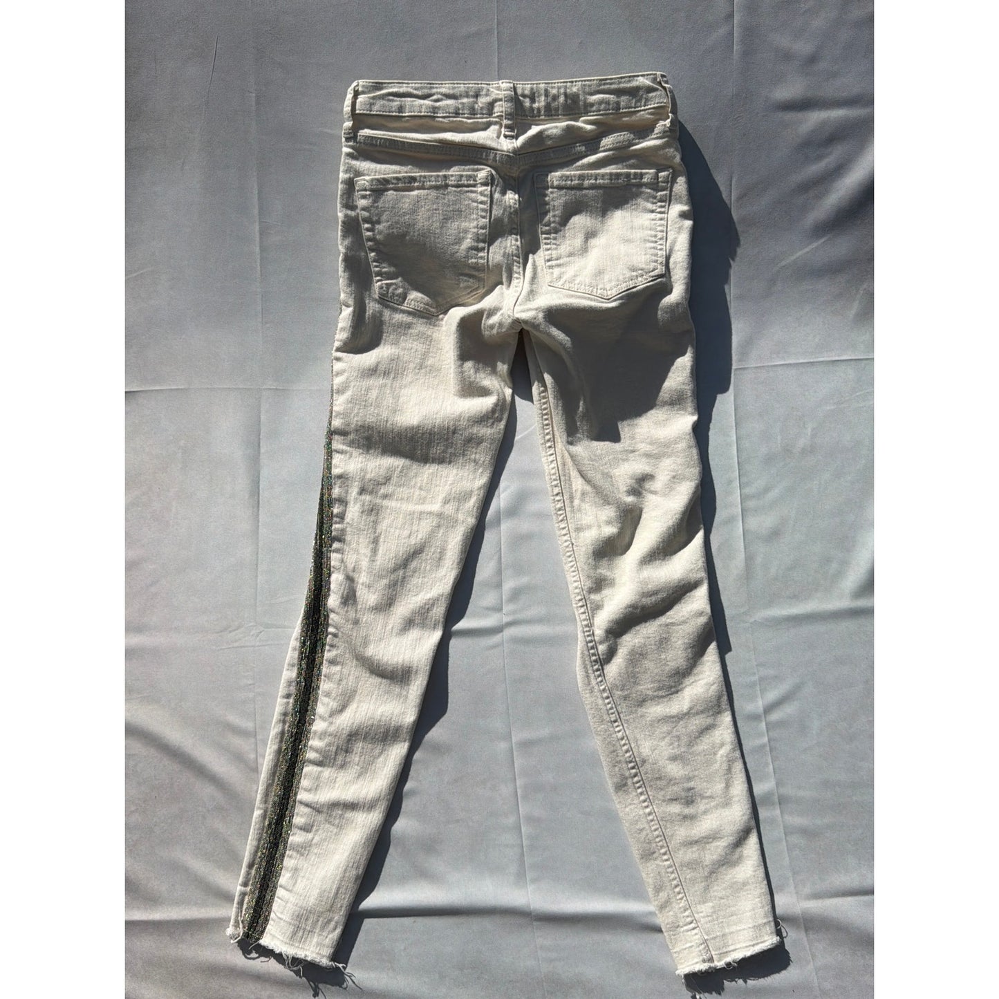 Free People Size 26W White With Beaded Sides Ripped Distressed Hem Jeans
